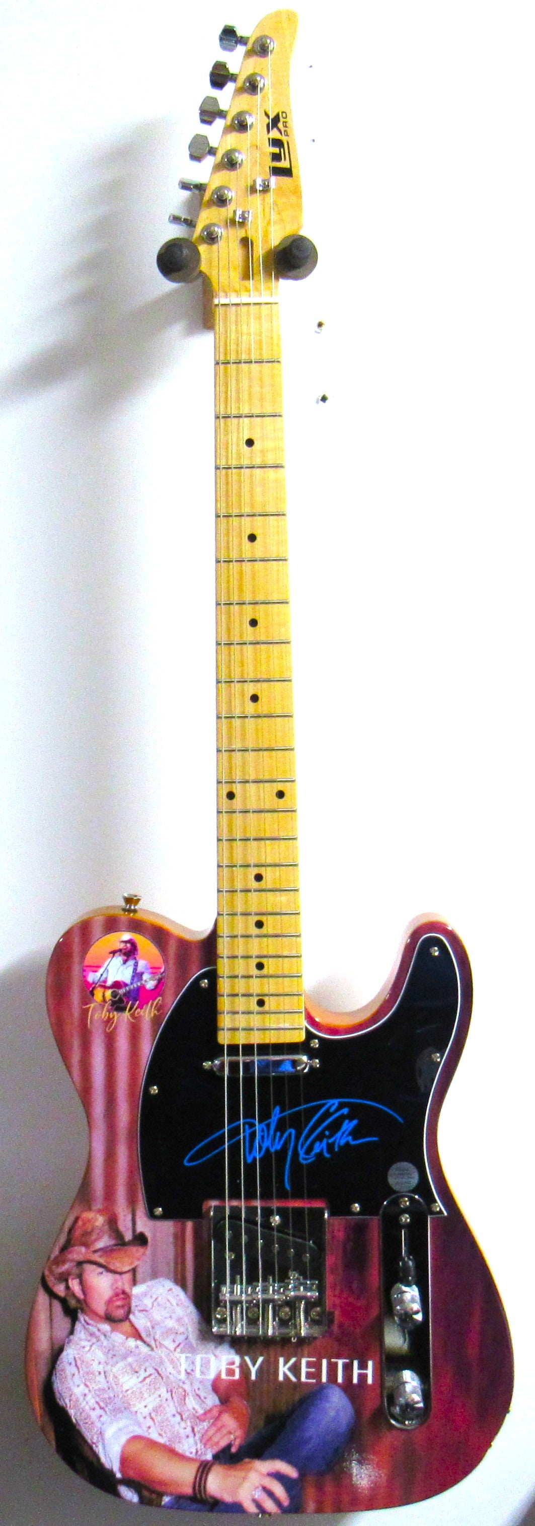 Toby Keith Autographed Guitar - Zion Graphic Collectibles