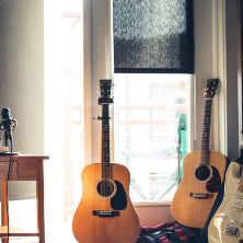 Two guitars in a room 