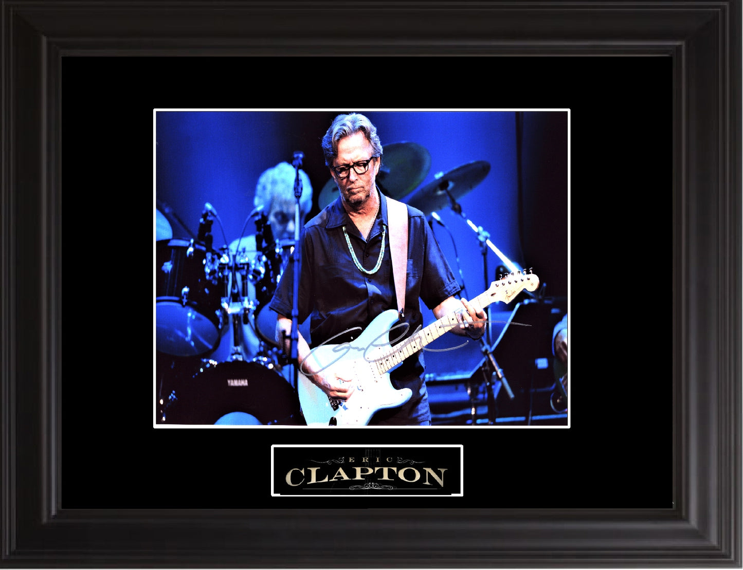 Eric Clapton Autographed Photo - Zion Graphic Collectibles